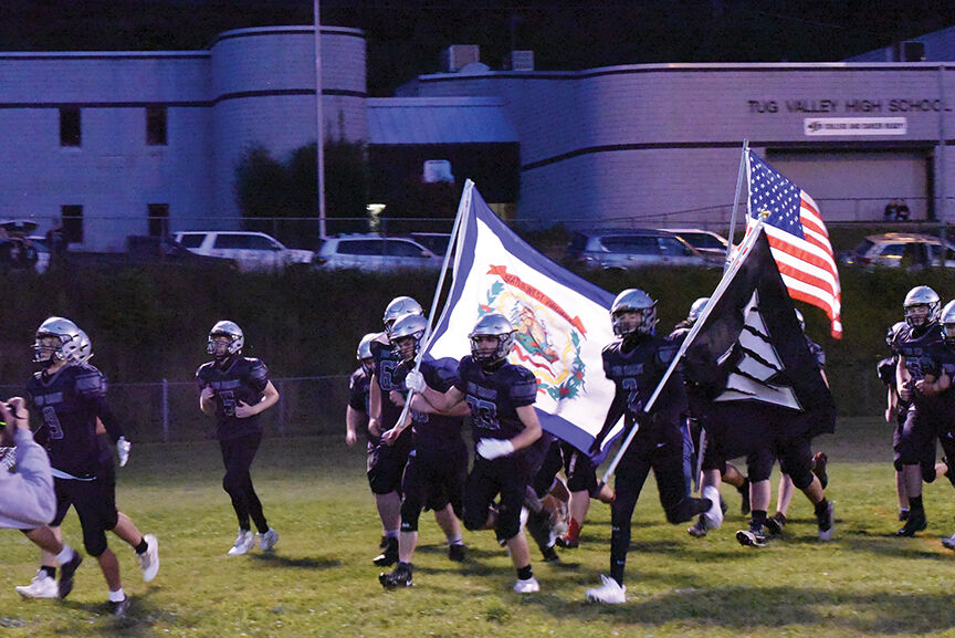 trevor tv team with flags.jpg